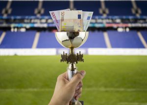 more euros more titles with the background of a stadium